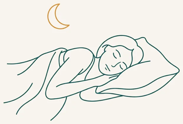 Dormeur paisible sur un oreiller cervical sous un croissant de lune